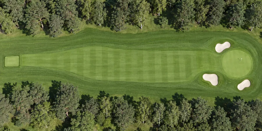 Aerial view of hole 1, Firs, from the tee on the left to the green on the right.