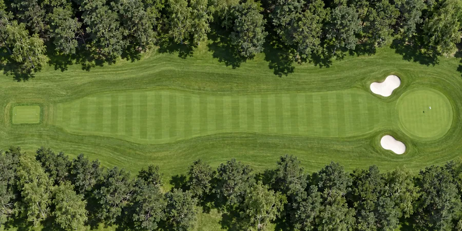 Aerial view of hole 10, Pinewalk, from the tee on the left to the green on the right.