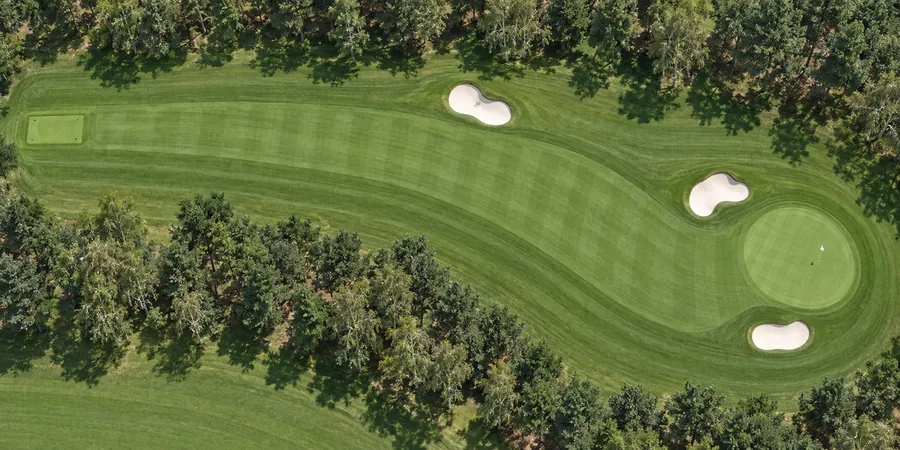 Aerial view of hole 11, Fox Covert, from the tee on the left to the green on the right.